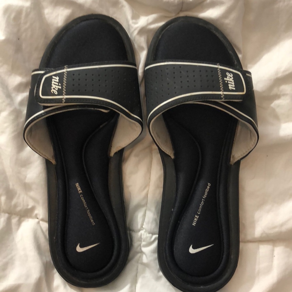 Black and white nike comfort footbed slides
